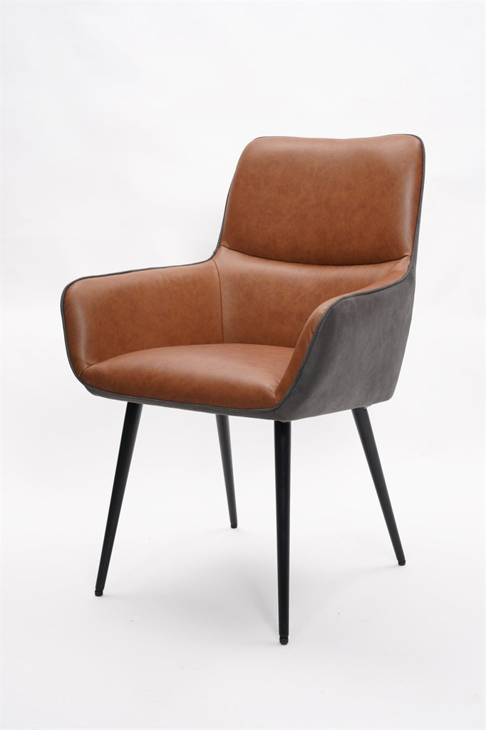 Brown faux leather dining chair with black metal legs and armrests on white background