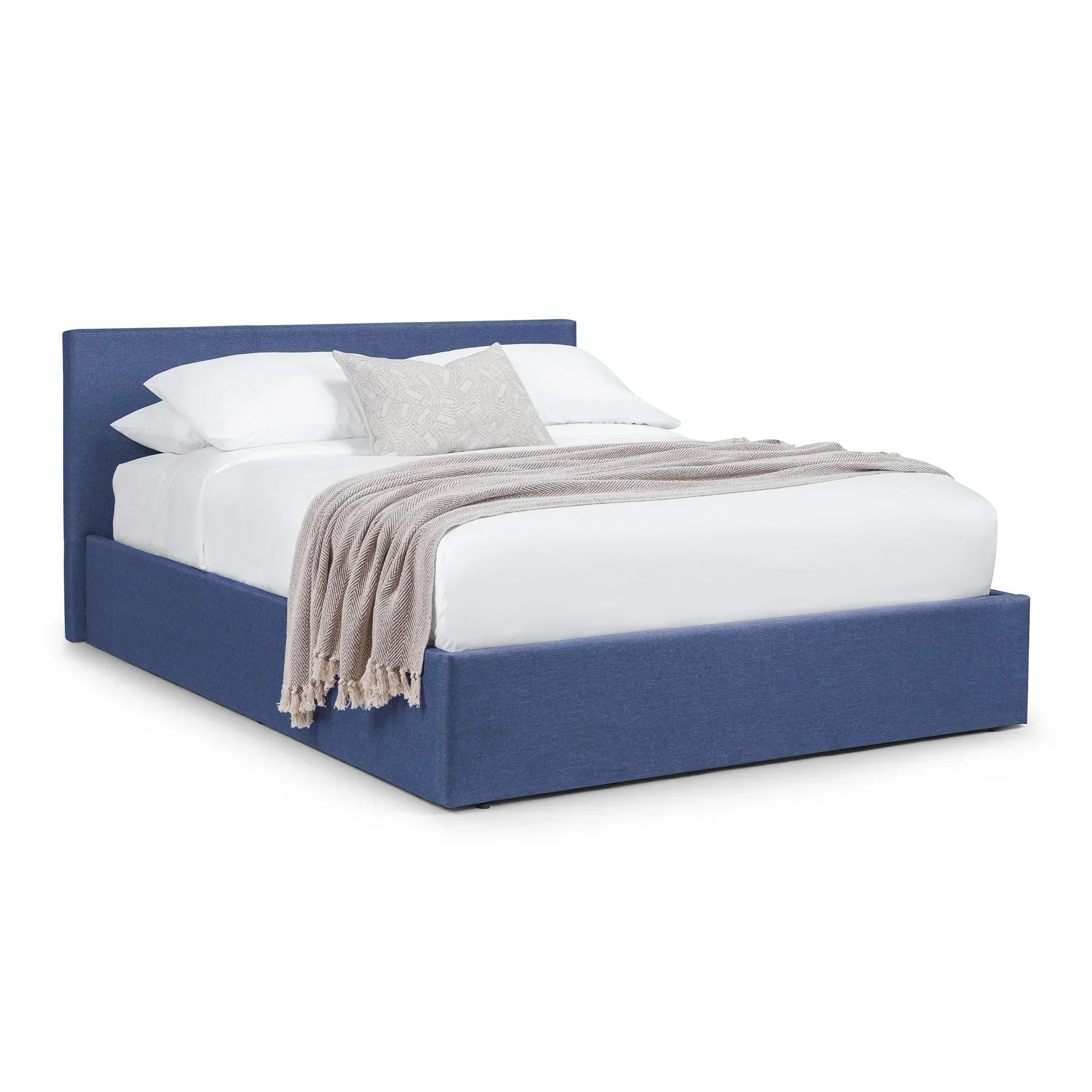 Blue upholstered storage bed with lift-up base, white bedding and neutral throw blanket