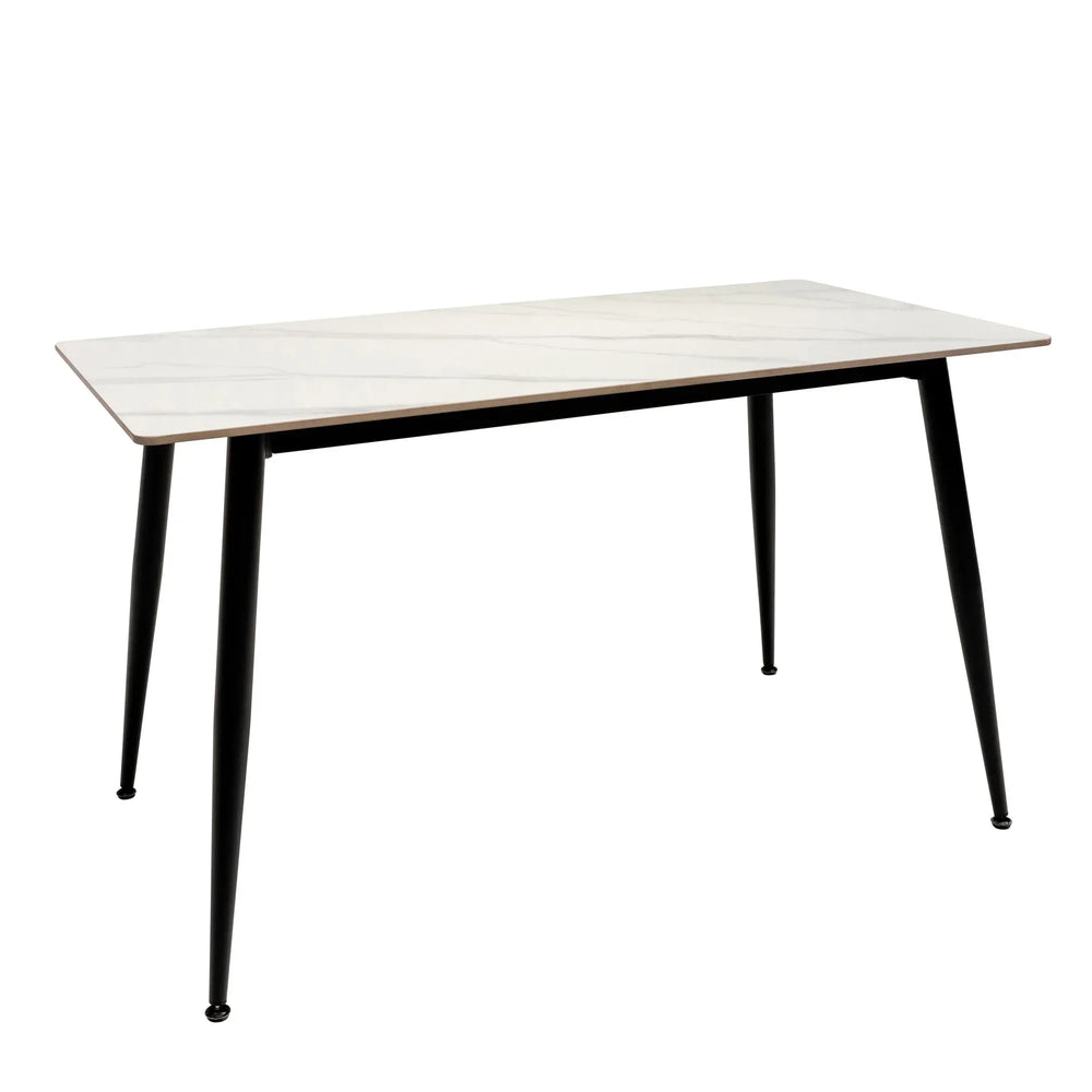 Rectangular white dining table with slim black legs and marble-effect top