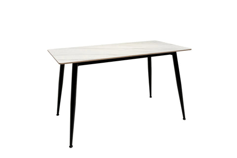 Rectangular white dining table with slim black legs and marble-effect top