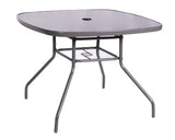 Square glass garden table with black metal frame and umbrella hole, angled side view
