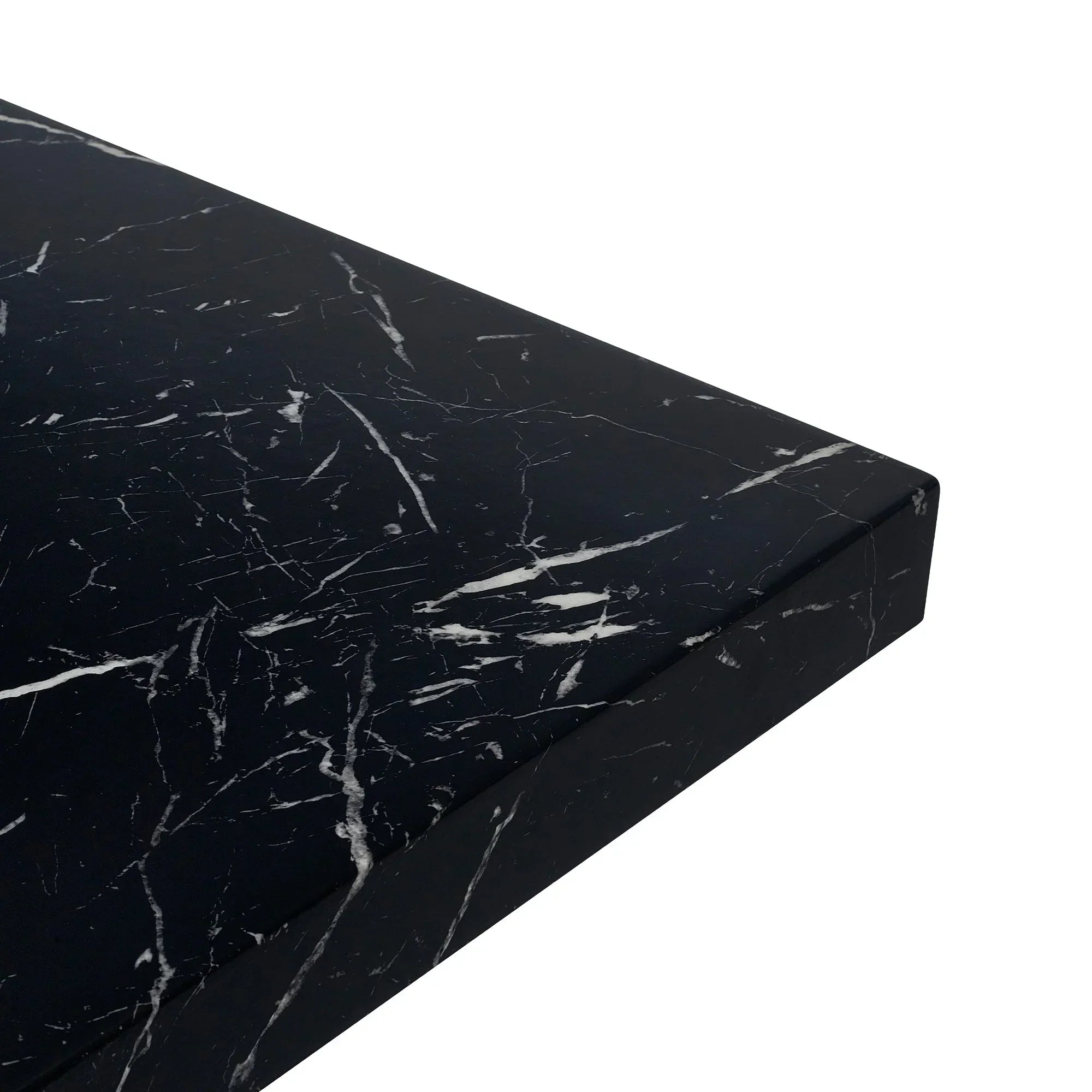 Black marble effect dining table corner with white veining detail