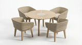 Four seater round dining table set with woven rattan chairs and padded seats