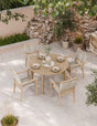 Round wooden outdoor dining set with four chairs on tiled patio, set for four people