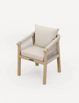 Beige wooden accent chair with rope sides and cushioned seat and backrest on white background