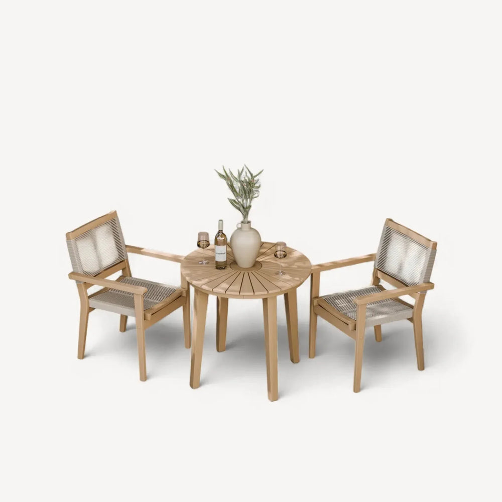 Wooden garden bistro set with round table, two chairs, and neutral decor accents