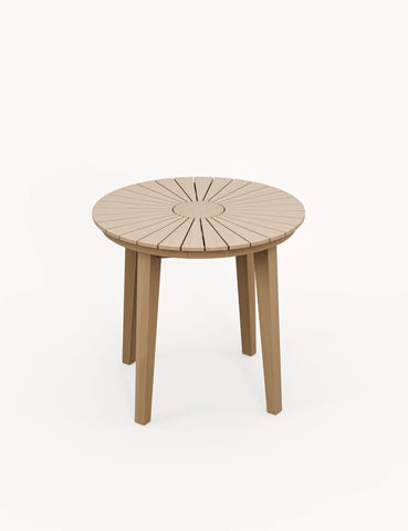 Round wooden side table with slatted top and four legs on white background
