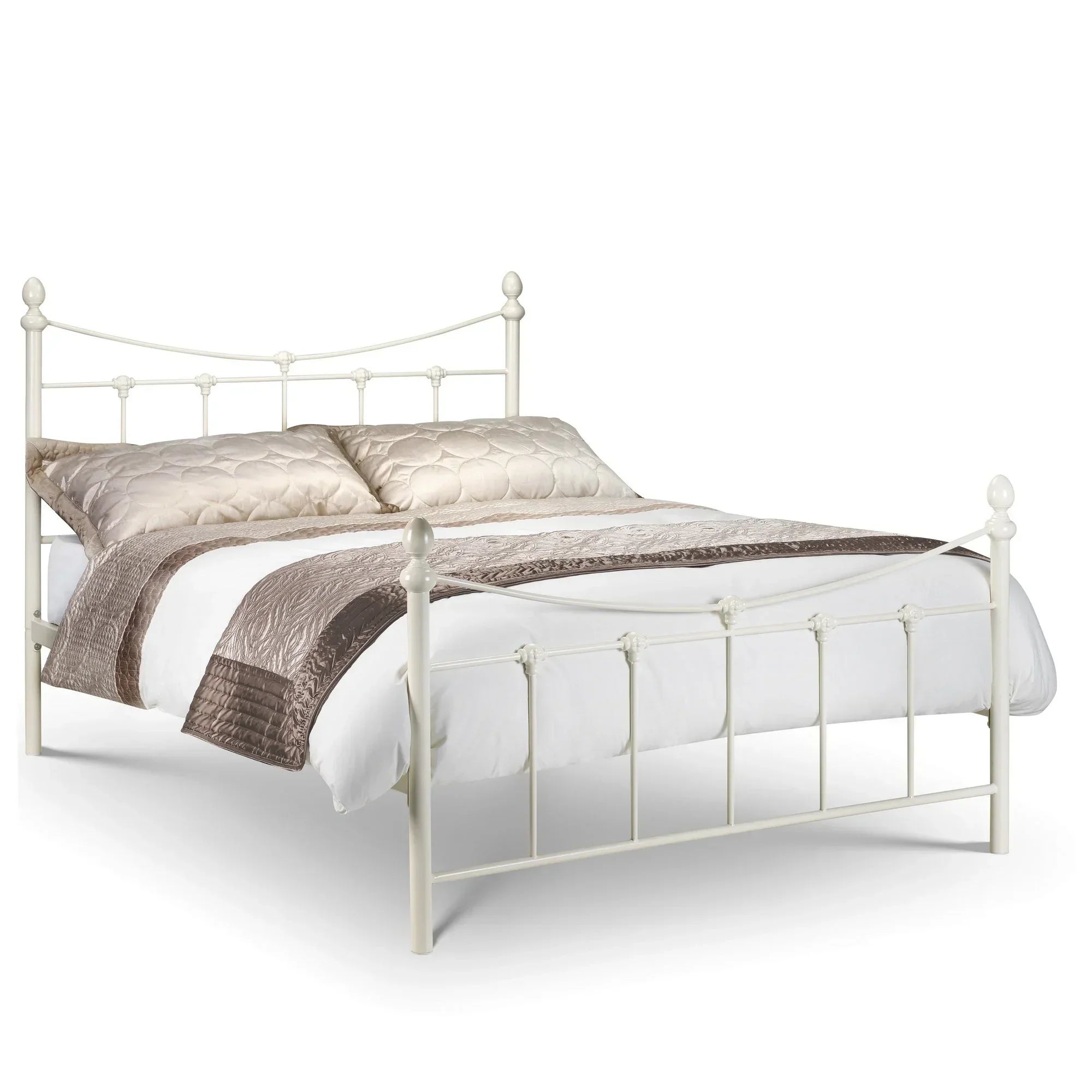 Stone white metal bed frame with curved headboard and footboard, dressed with neutral bedding