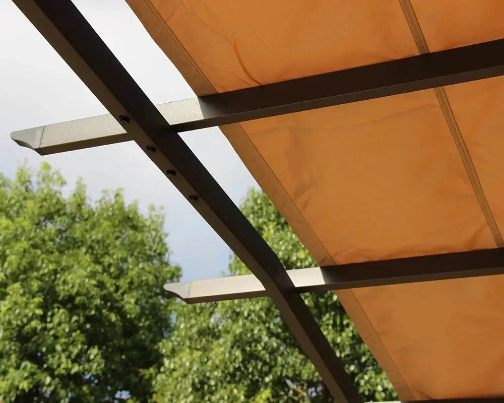 Mocha sliding pergola frame and fabric canopy close-up with trees in background