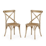 Two light wooden dining chairs with cane seats placed side by side on white background