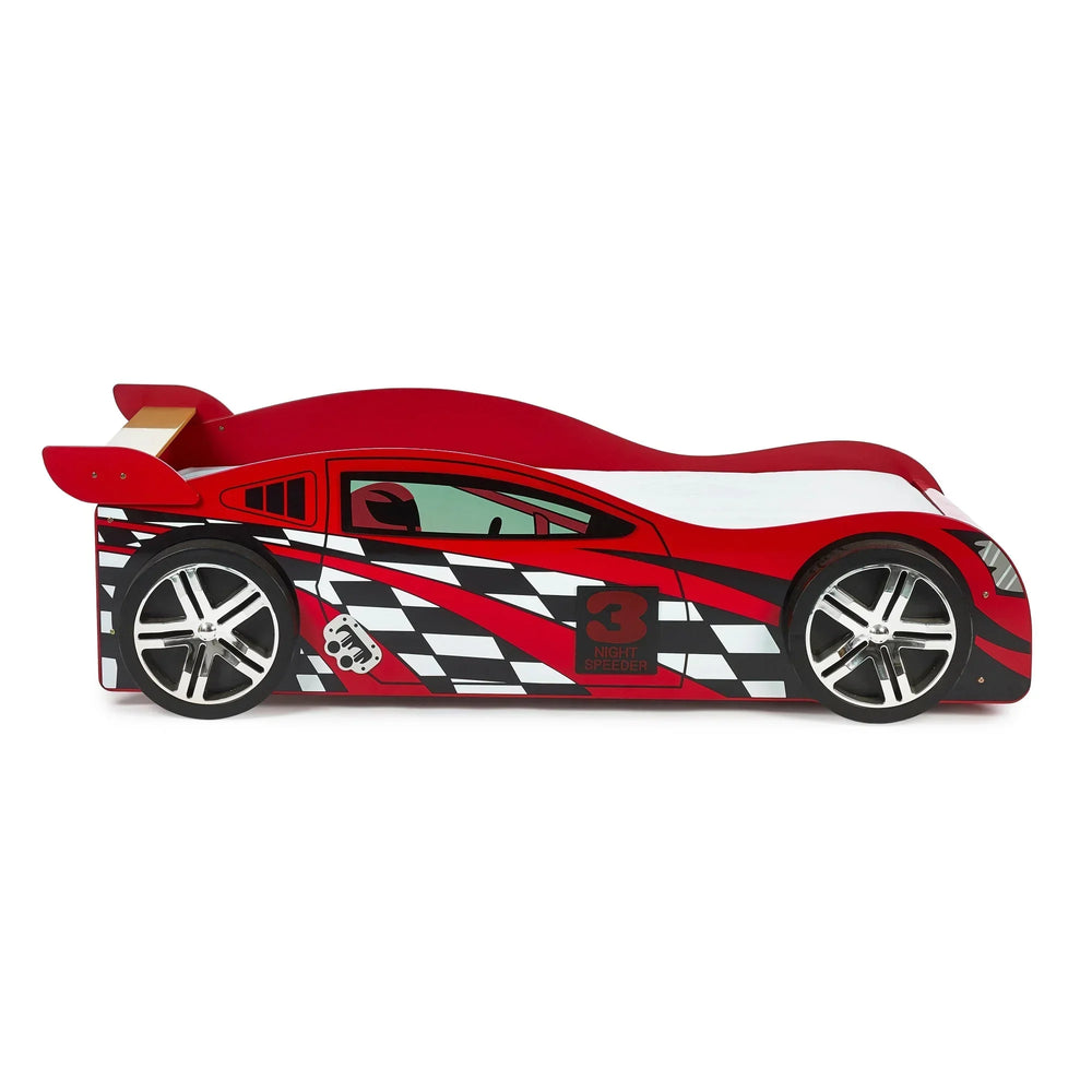 Red racing car bed for kids with checkerboard pattern design and spoiler, side angle view