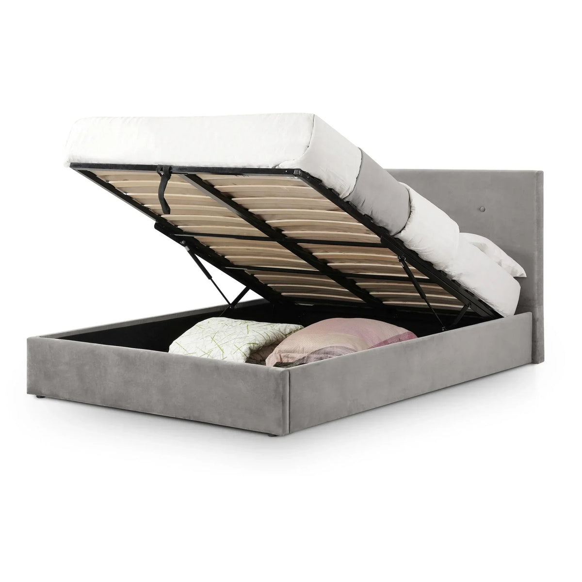 Grey upholstered storage bed with high headboard and lift-up mattress showing bedding inside
