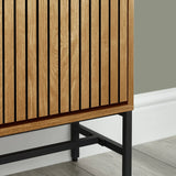 Slatted wood sideboard corner with black metal legs on light grey flooring