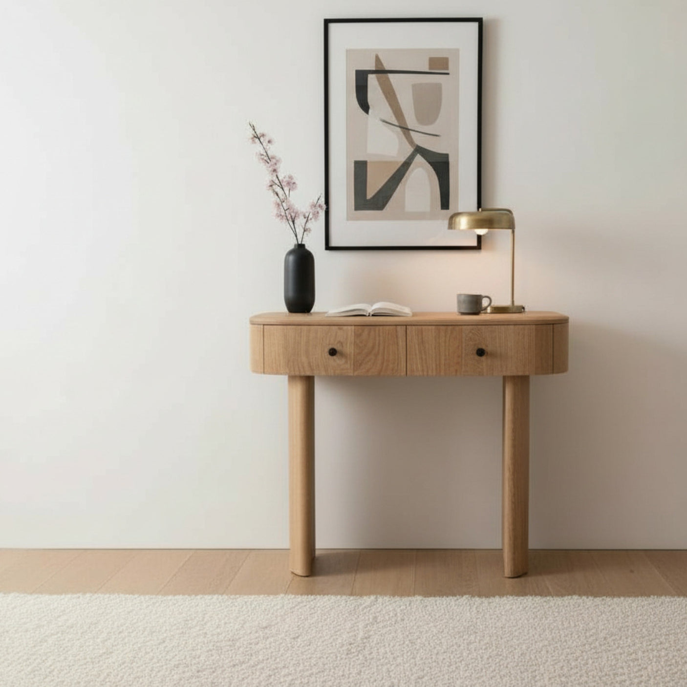 Wooden console table with decorative items against a white wall