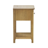 Back view of light oak bedside table, showing solid wood back panel and tapered legs