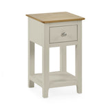 Freestanding cream painted bedside table with oak top and single drawer isolated on white