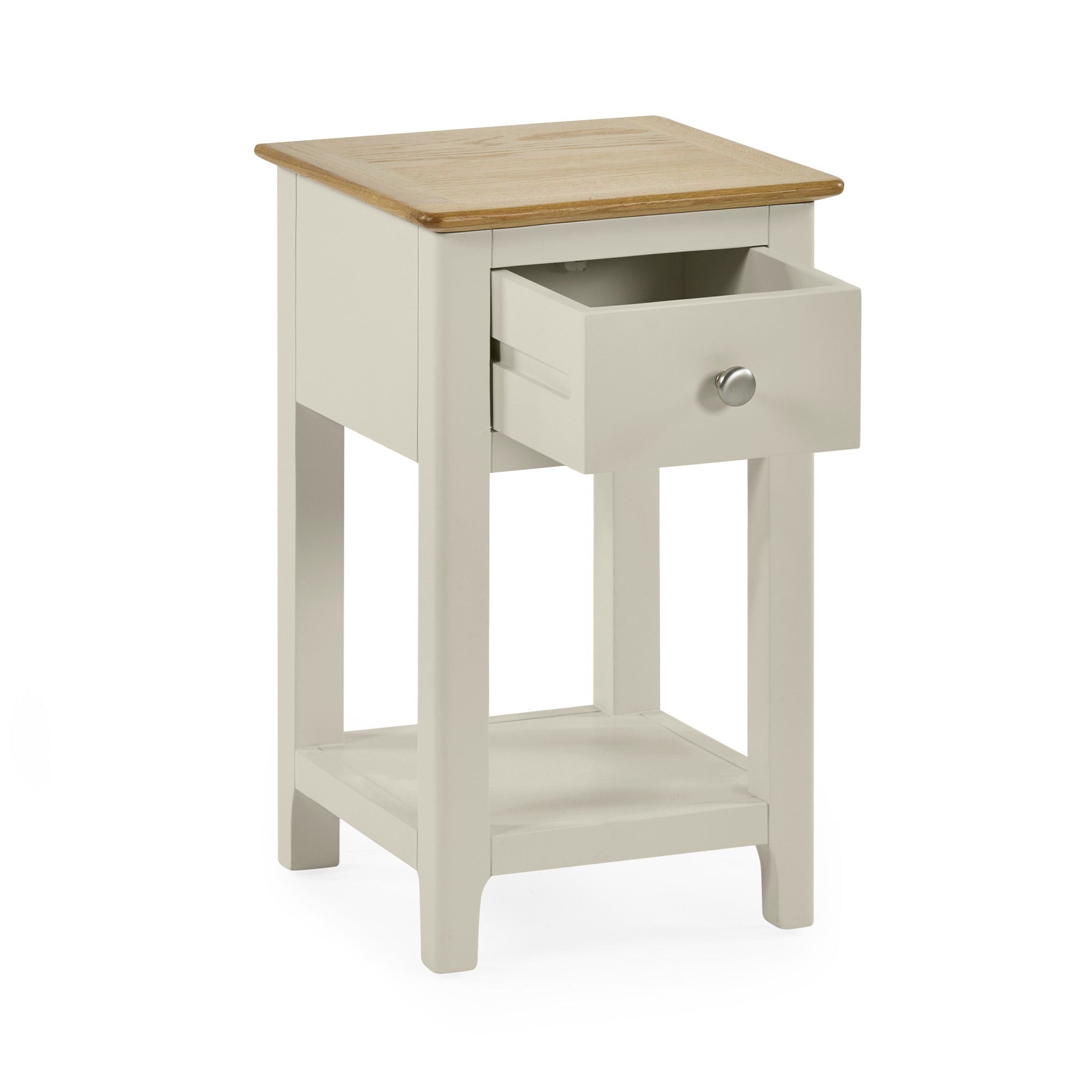 Three quarter view of light grey painted bedside table with oak top and open drawer.
