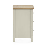Side view of light grey bedside table showing flat panel design, natural wood top and silver drawer knobs