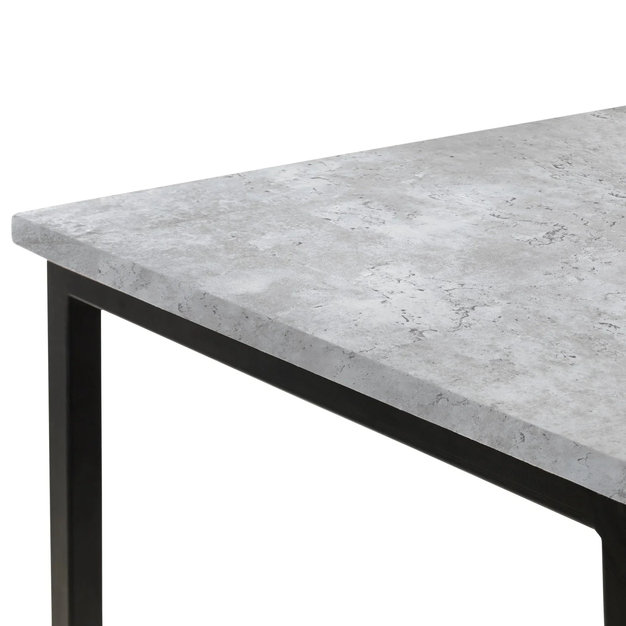 Closeup of modern desk with concrete effect tabletop and black metal frame