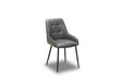 A modern gray upholstered dining chair with a tufted backrest and slim black metal legs, shown on a plain white background.