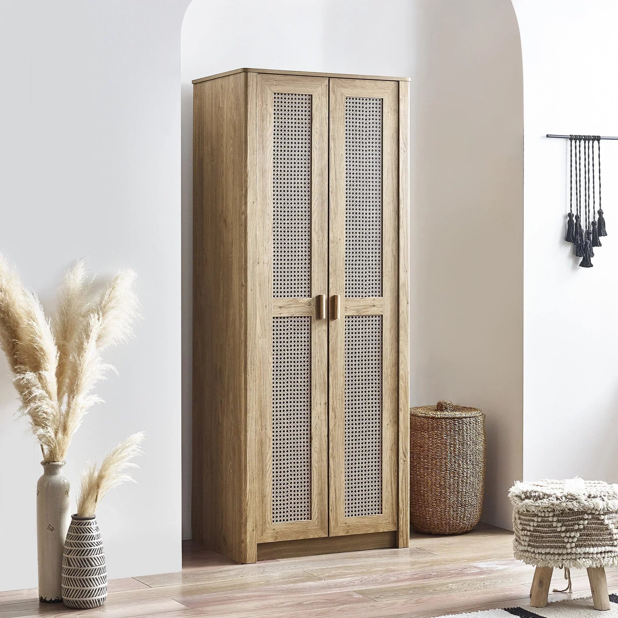 Sydney rattan effect wardrobe with double doors in light wood finish, styled in modern room
