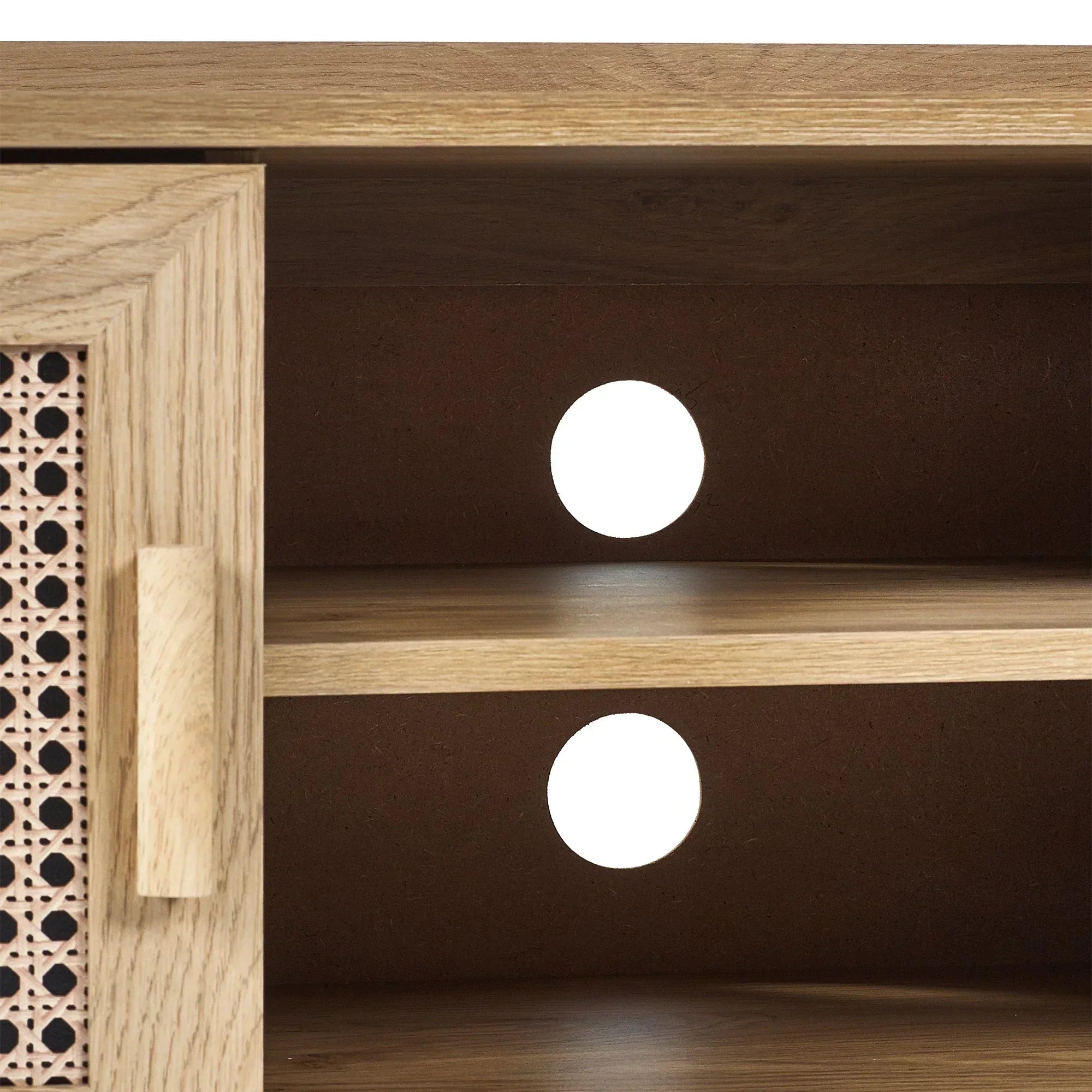 Rattan effect media unit detail showing wood shelf with cable holes and cane panel door
