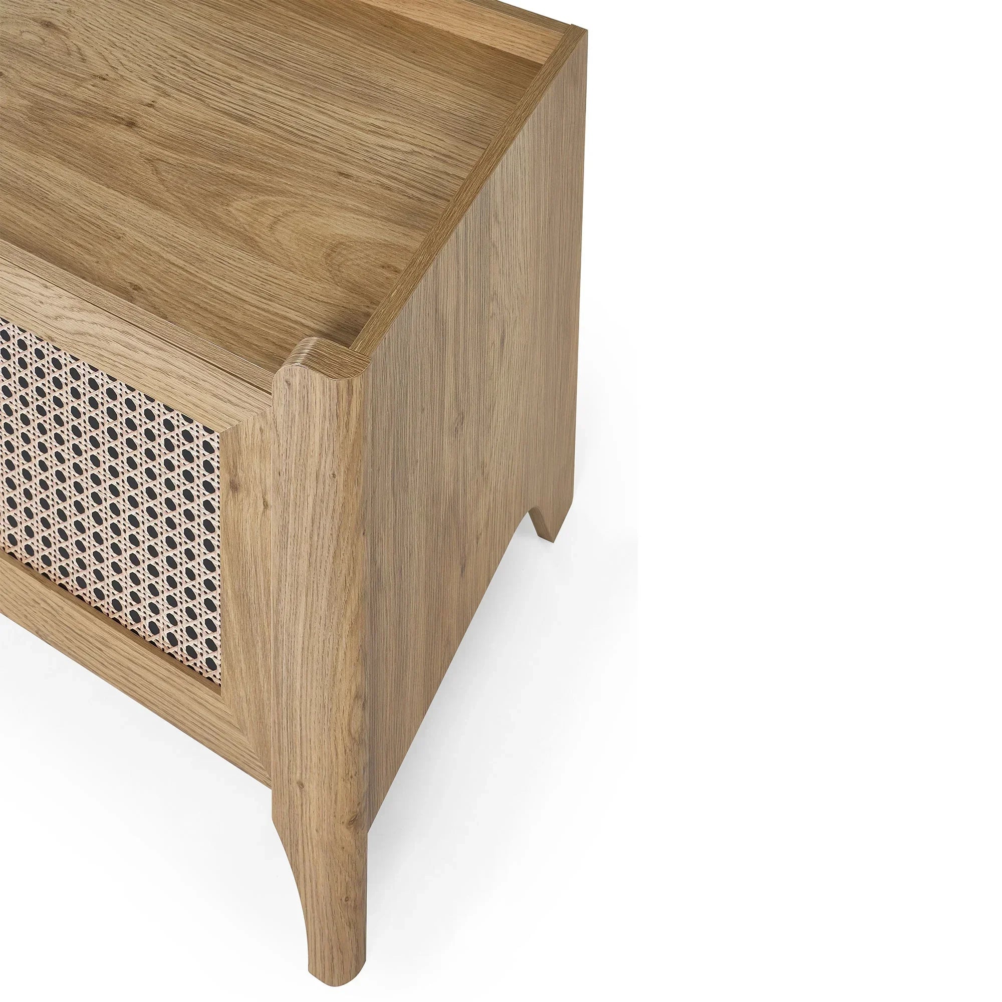 Corner view of rattan effect media unit showing natural wood grain and woven panel detailing