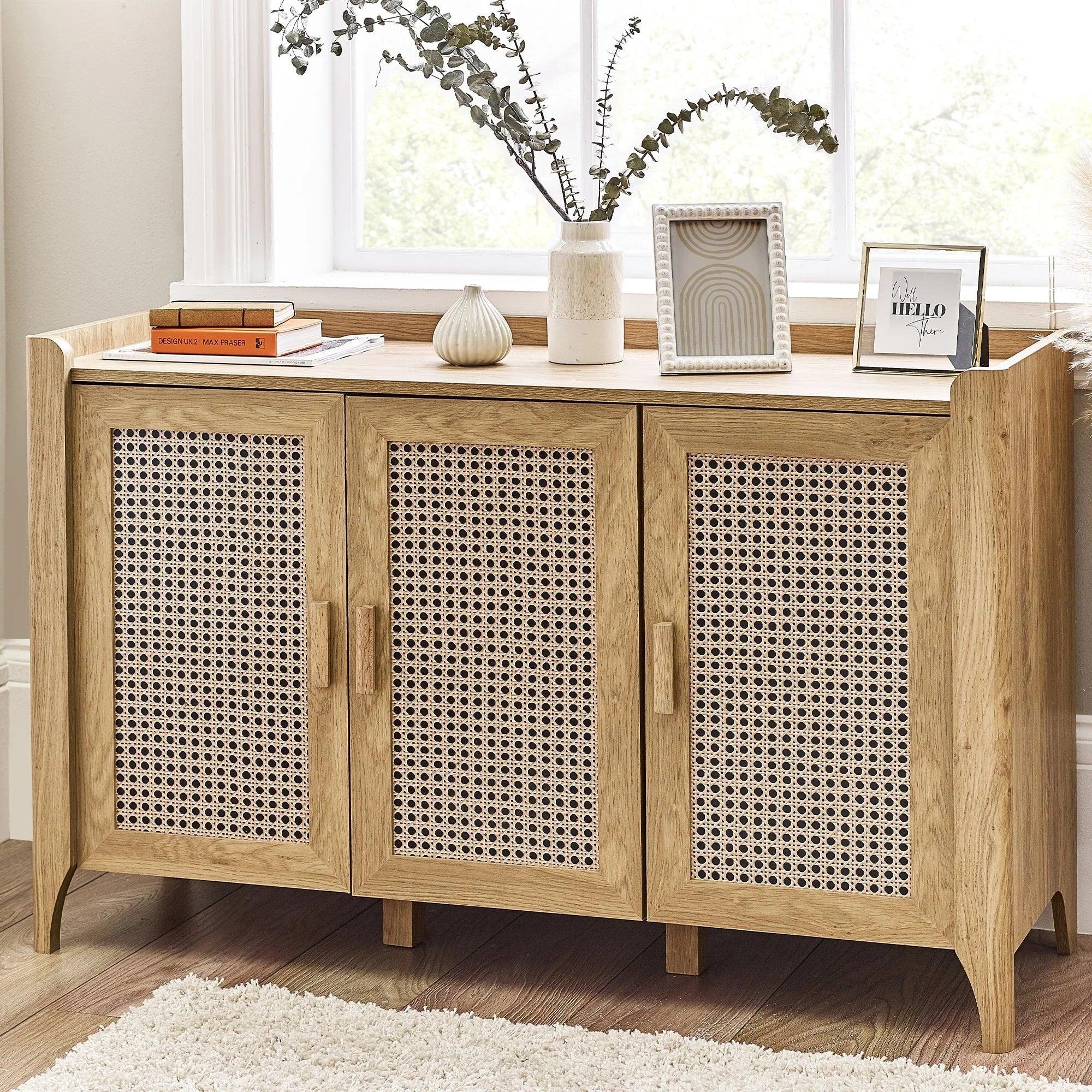 Sydney rattan effect 3 door sideboard in light wood with decor in bright living room