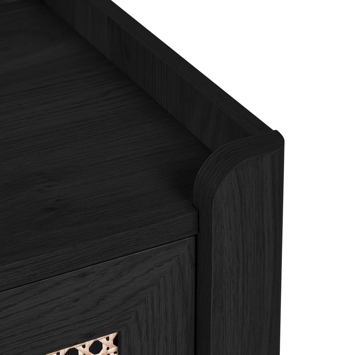 Close up of Sydney rattan effect black ash 3 drawer chest corner and wood grain detail