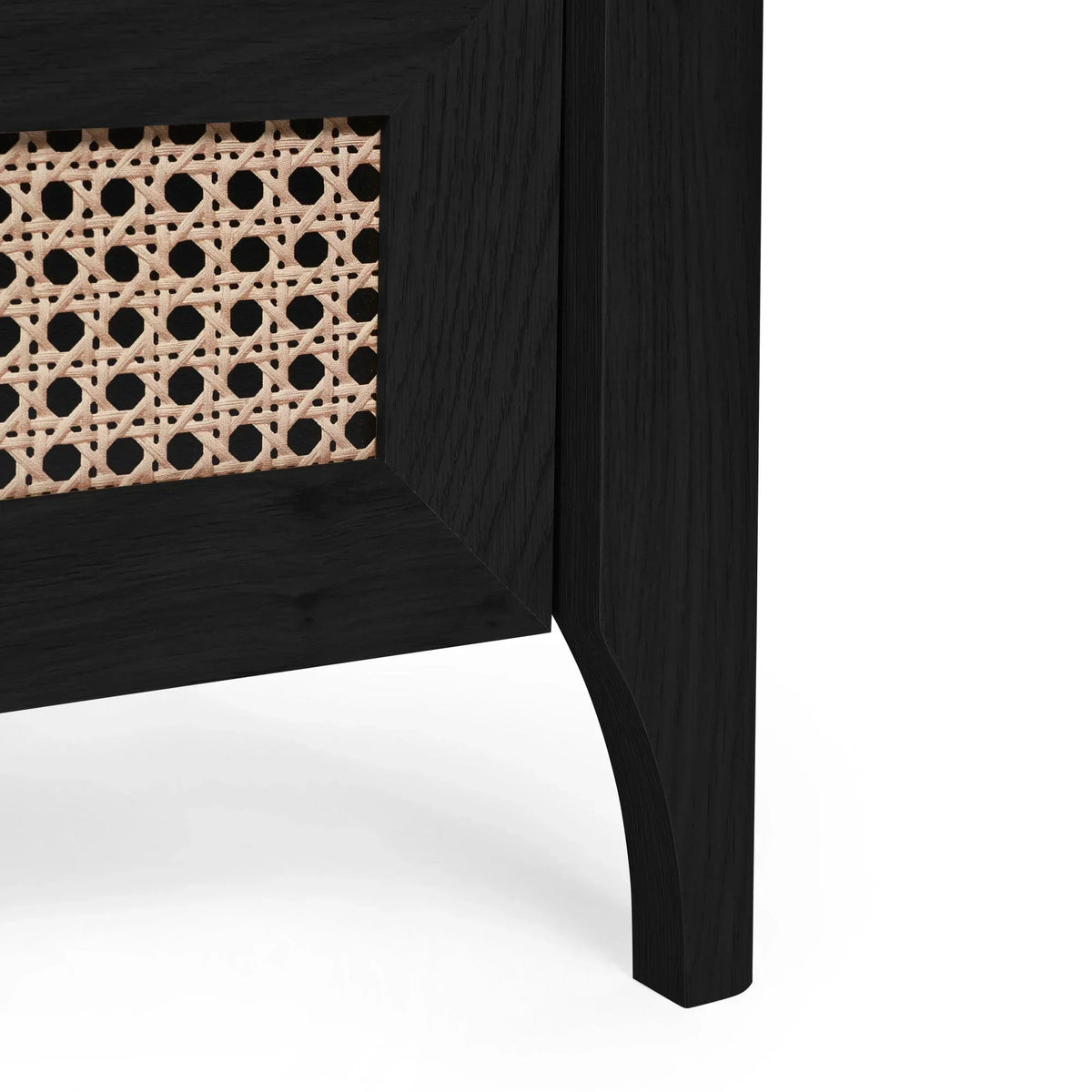 Sydney rattan effect chest close-up showing black ash frame and woven cane drawer front