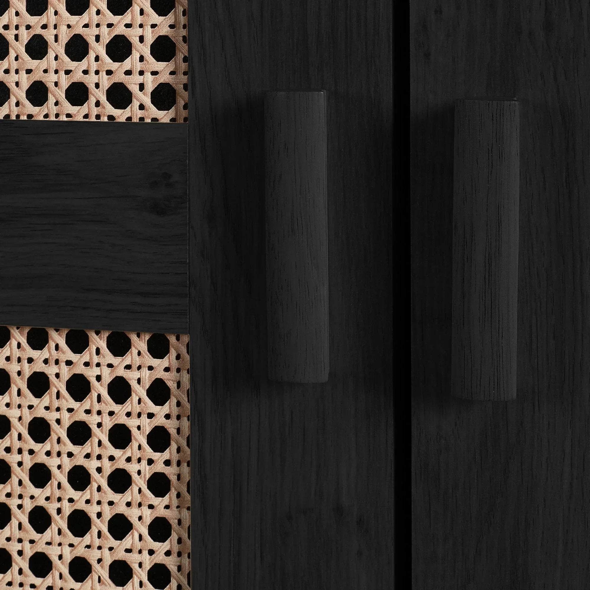 Closeup of Sydney rattan effect black ash wardrobe doors with cane panel and handles