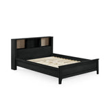 Black double bed with rattan inset shelves in headboard, no mattress, angled view on white background