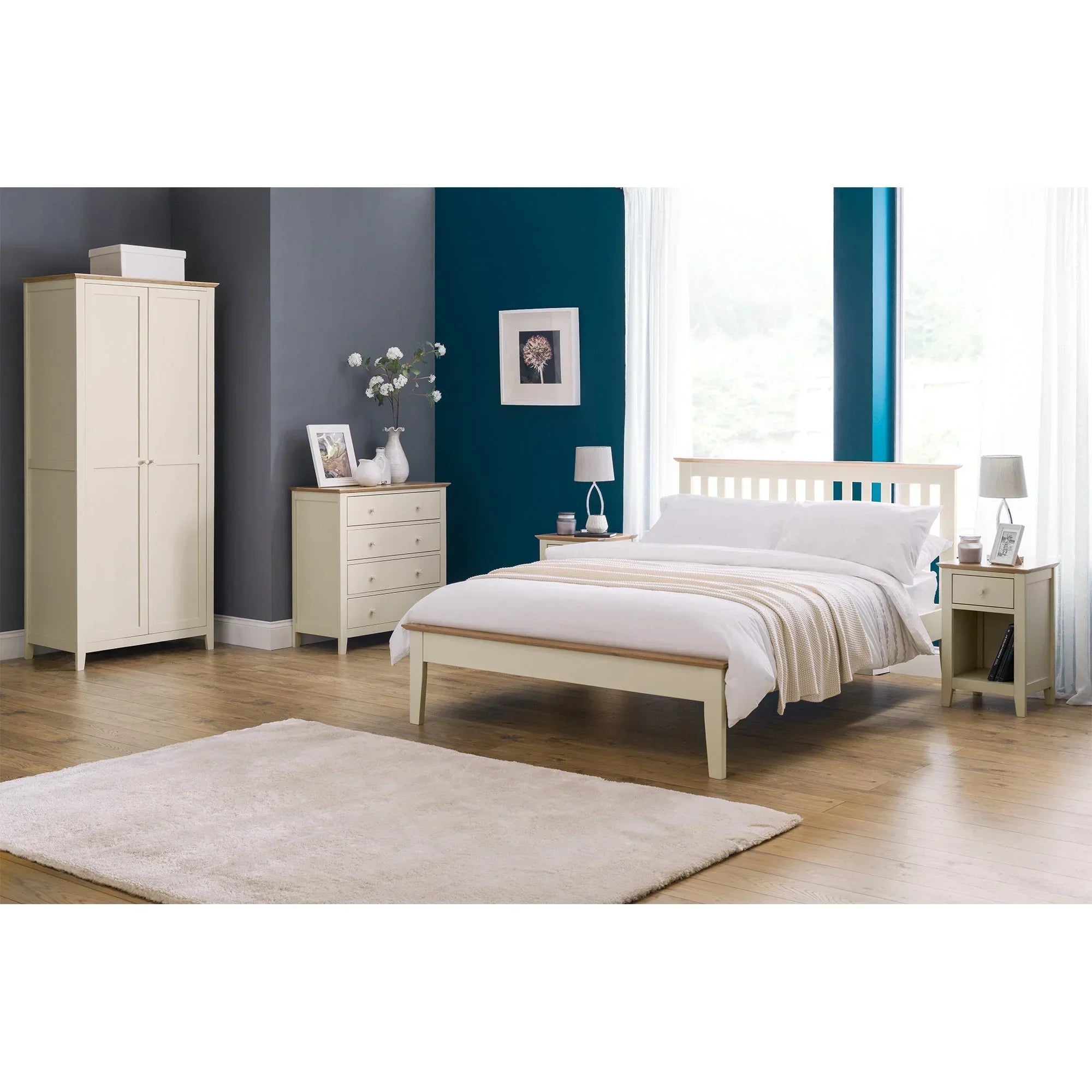 Two-tone bedroom furniture set with cream wardrobe, drawers, bed and bedside table on wood floor