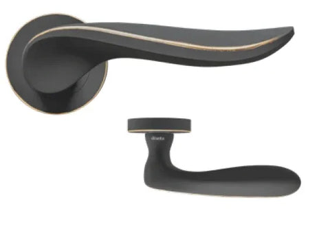 Matte black door handle with gold trim and round rose detail, shown from two angles