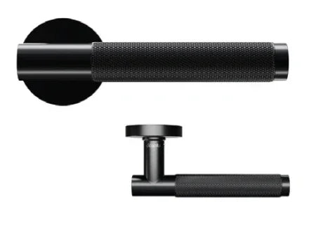 Matte black textured door handle with round backplate, side and top view