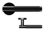 Matte black textured door handle with round backplate, side and top view