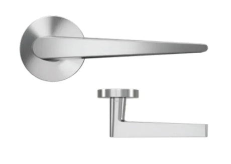 Brushed chrome door handles with round bases on white background