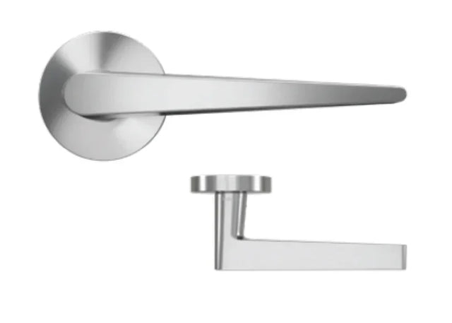 Brushed chrome door handles with round bases on white background