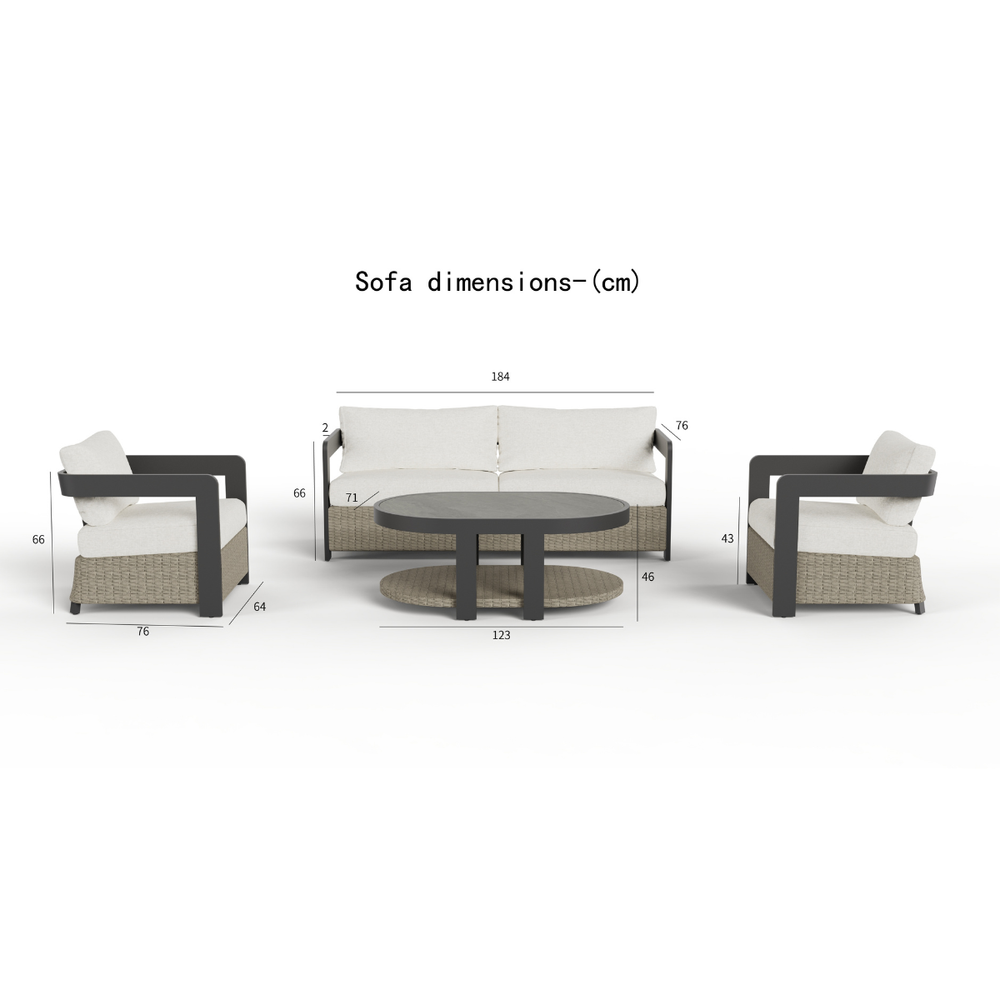 Light beige cushioned seating with dark brown woven base and black armrests alongside round table