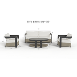 Light beige cushioned seating with dark brown woven base and black armrests alongside round table