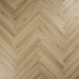 Smokey oak herringbone flooring with natural wood texture and light brown finish