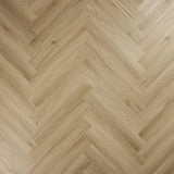 Smokey oak herringbone flooring with natural wood texture and light brown finish