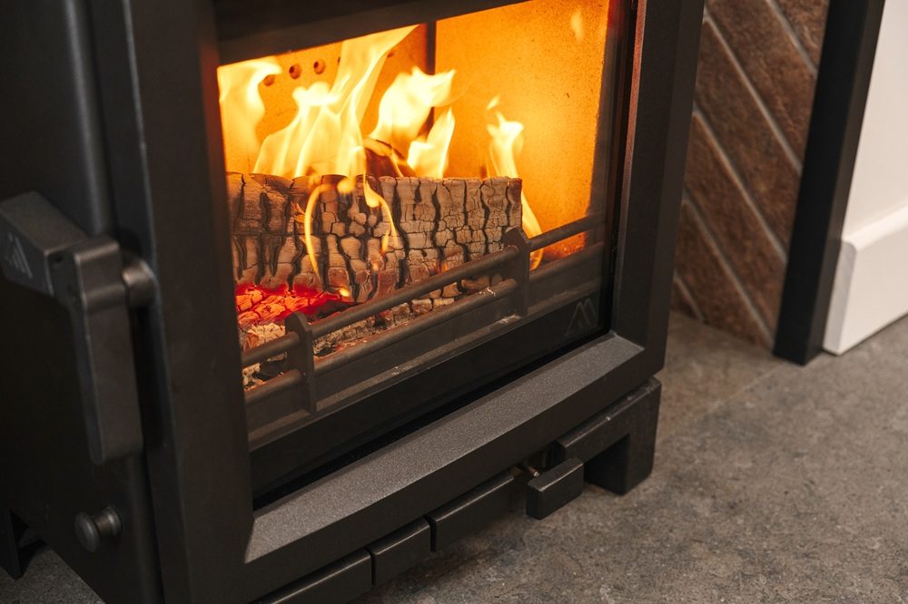 Close-up of Mourne Summit 5 stove larger viewing window showing flames