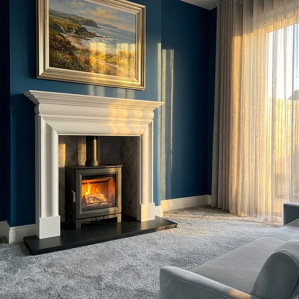 Mourne Summit 8 Stove burning brightly in a modern living room setting
