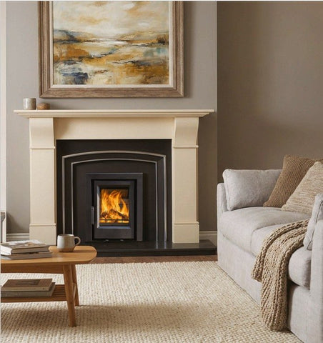Contemporary inset stove burning wood fuel with clear glass view