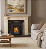 Contemporary inset stove burning wood fuel with clear glass view