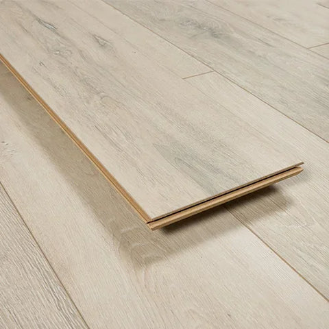 Sunbleached oak flooring plank with wood grain texture on light laminate floor