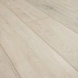 Sun bleached oak wood flooring with natural grain pattern, close-up angle