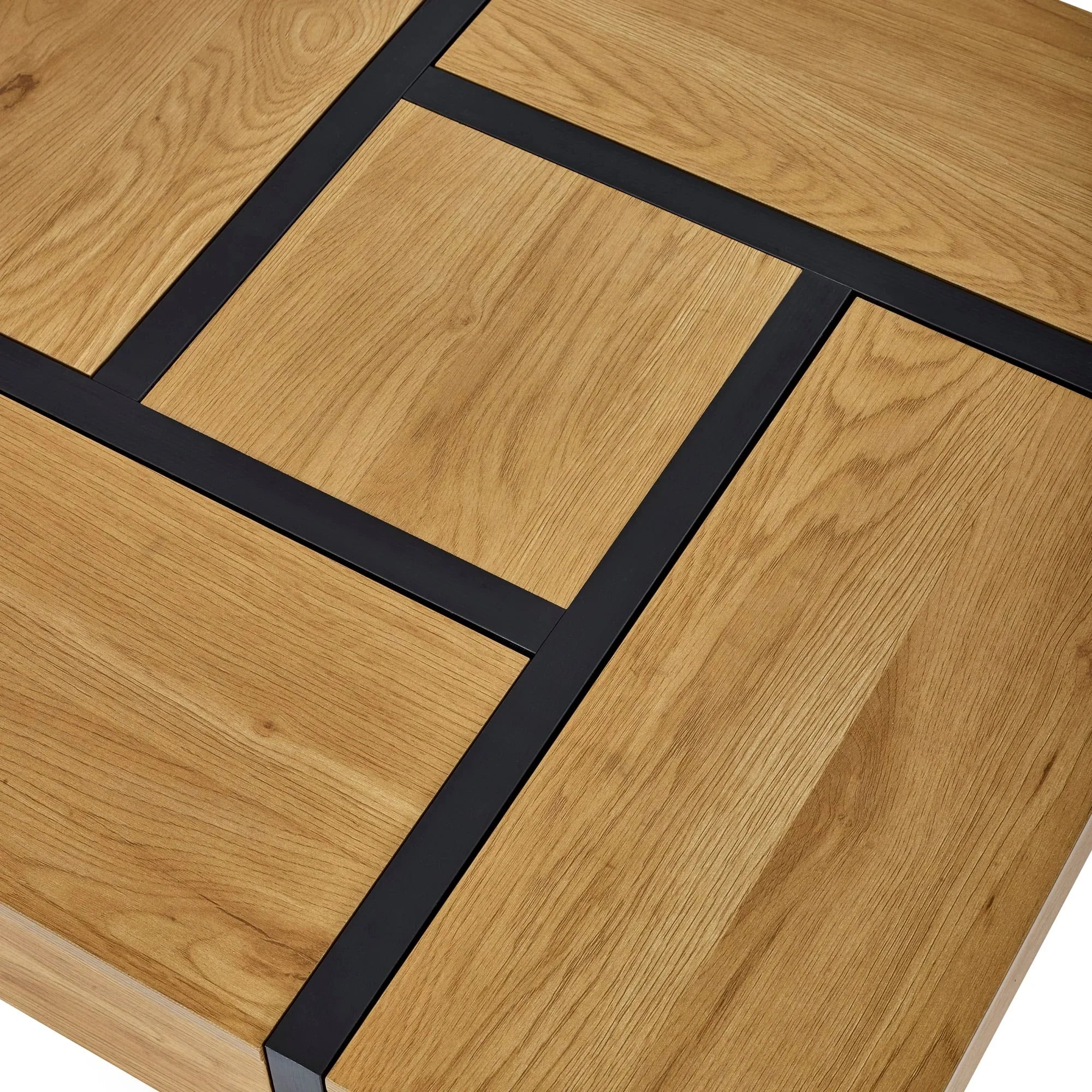 Closeup of oak coffee table top with black metal geometric inlay detail
