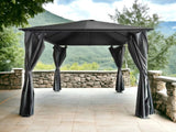 Black outdoor gazebo with curtains on stone patio overlooking green hills